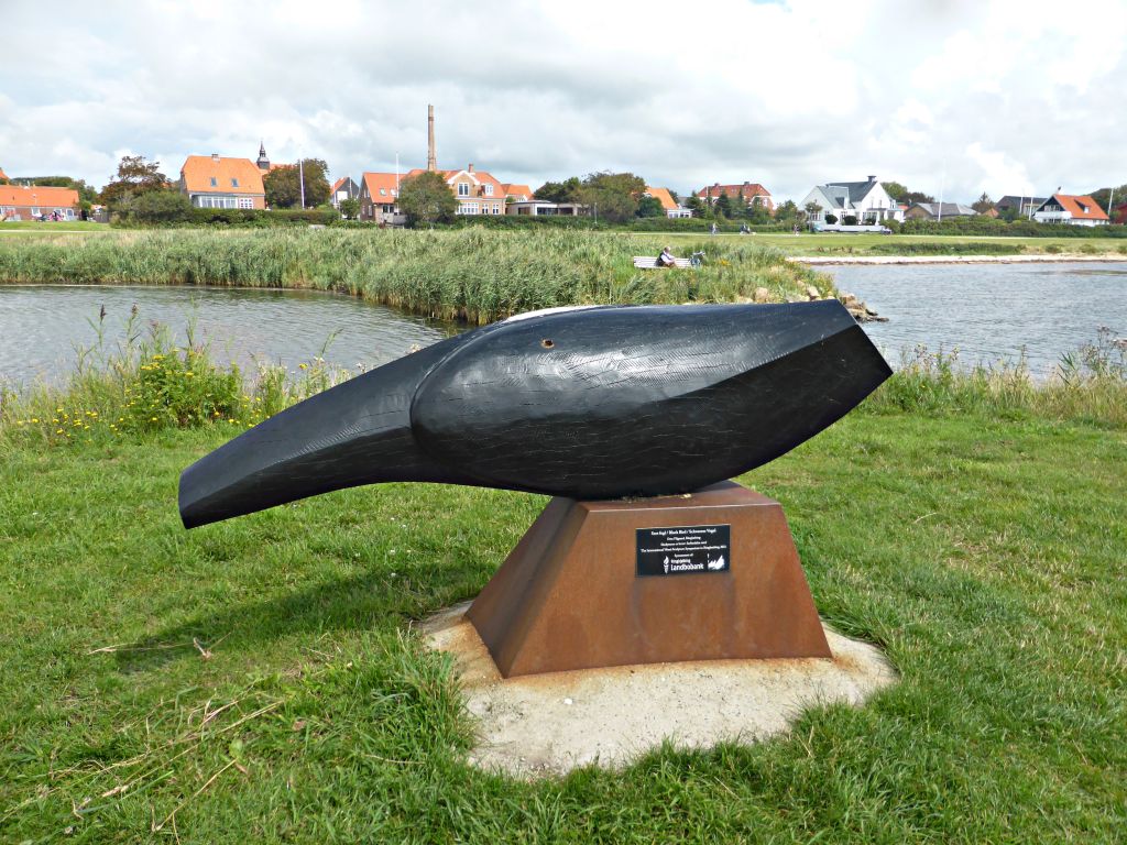 træfigur på havnen