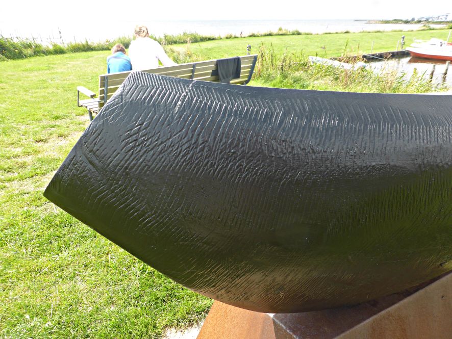 træfigur på havnen